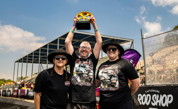 Summernats entrant hoisting up a trophy 720x440 Summernats entrant hoisting up a trophy